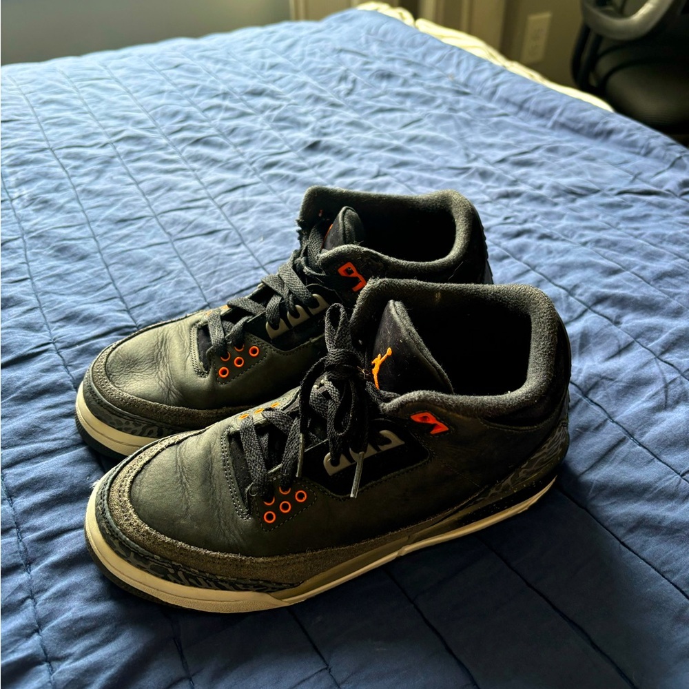Gray/Black with orange Jordan Retros